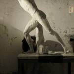 Students learn how to restore the old plaster statues