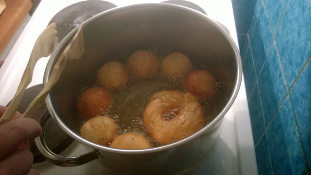 Frying Munkkis in the pot with oil