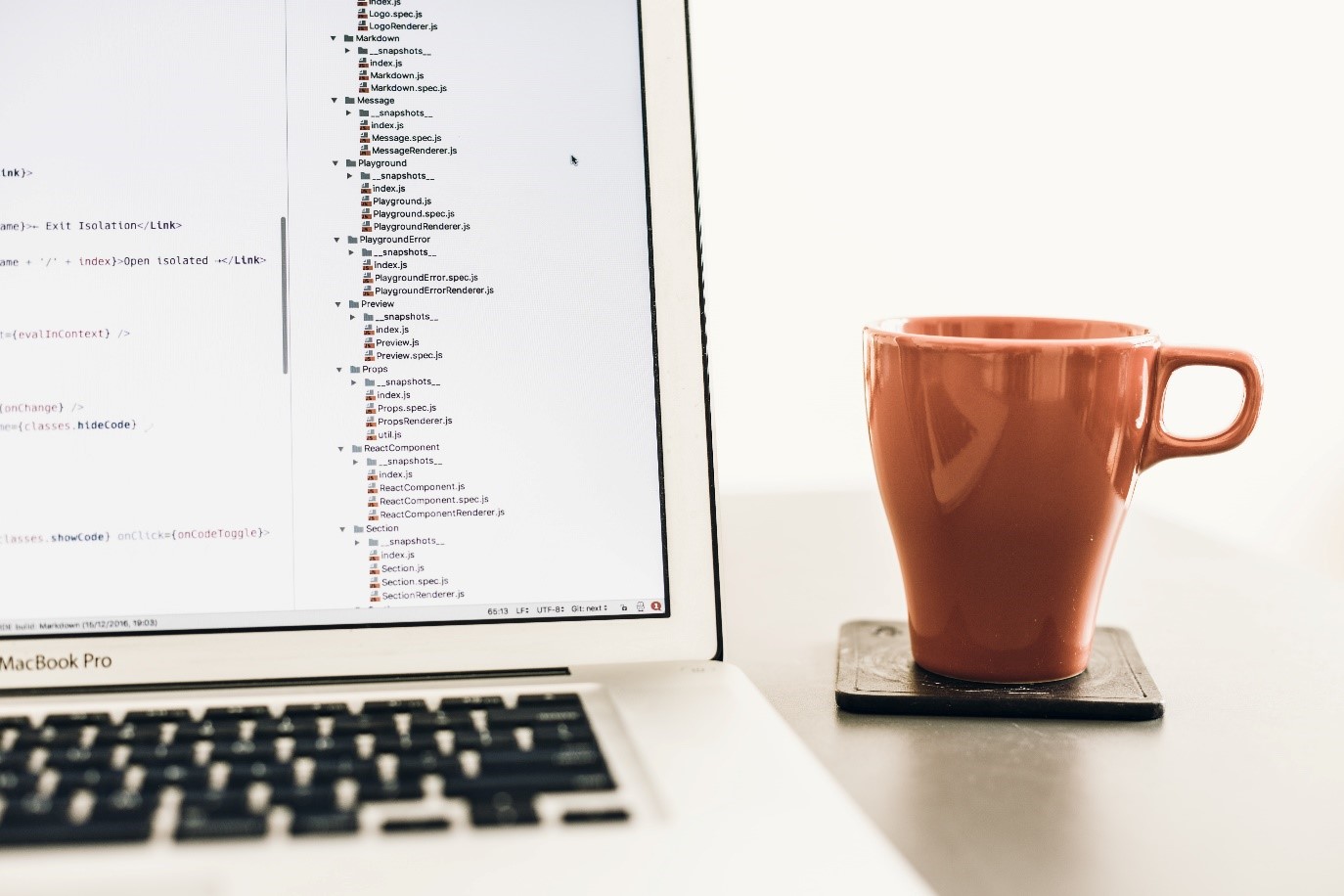 A laptop and a mug.
