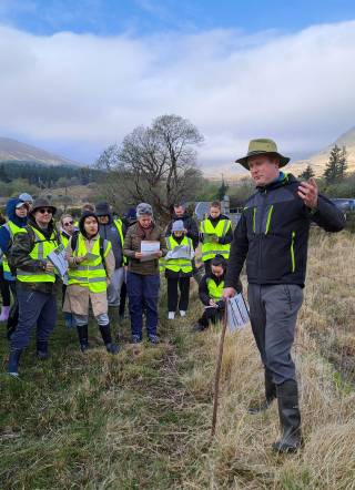 Farmer Colm Gavin talking to a group of students