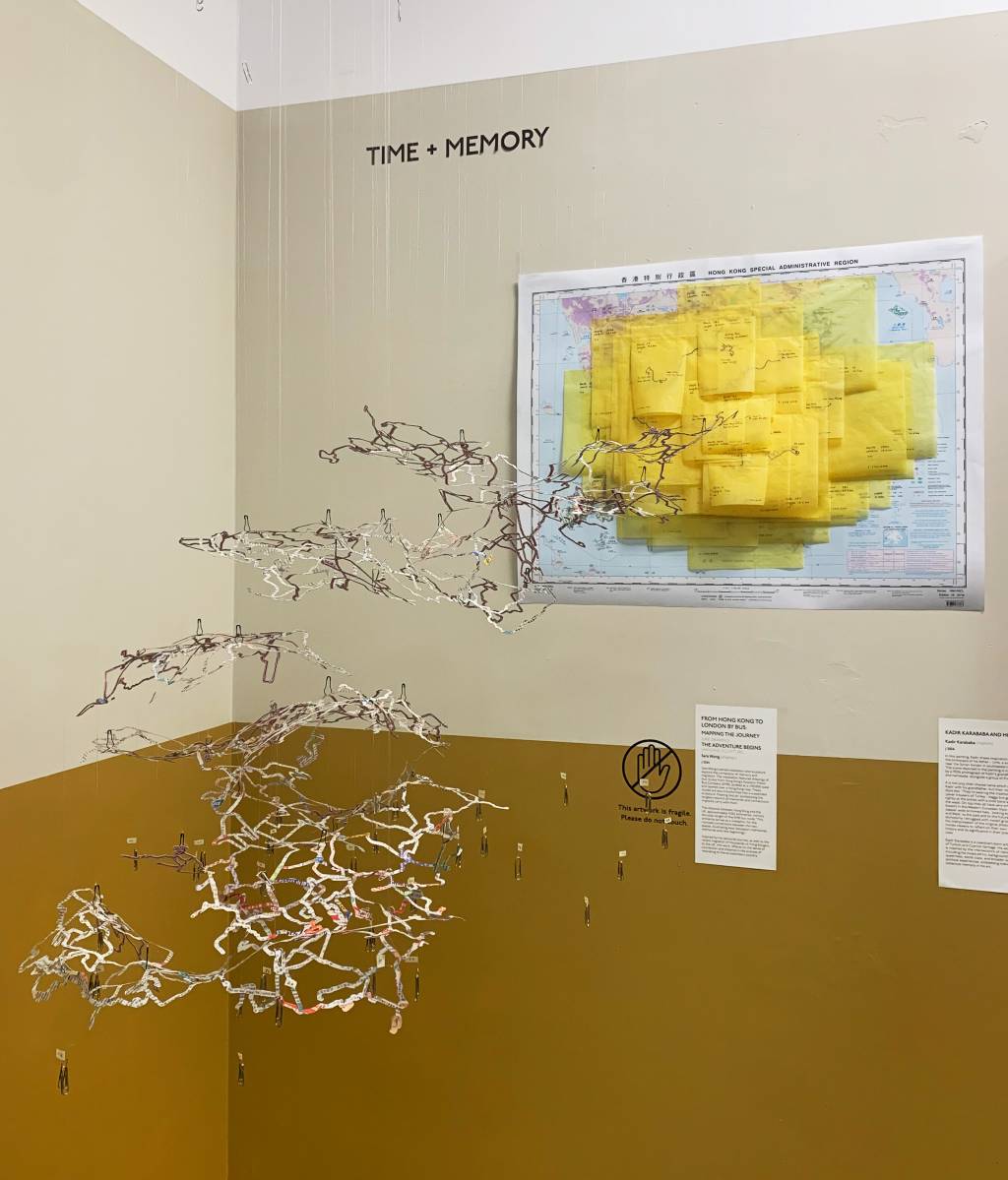 Hanging sculpture made of Hong Kong map symbolizing networks and memories that migrants carry in them.