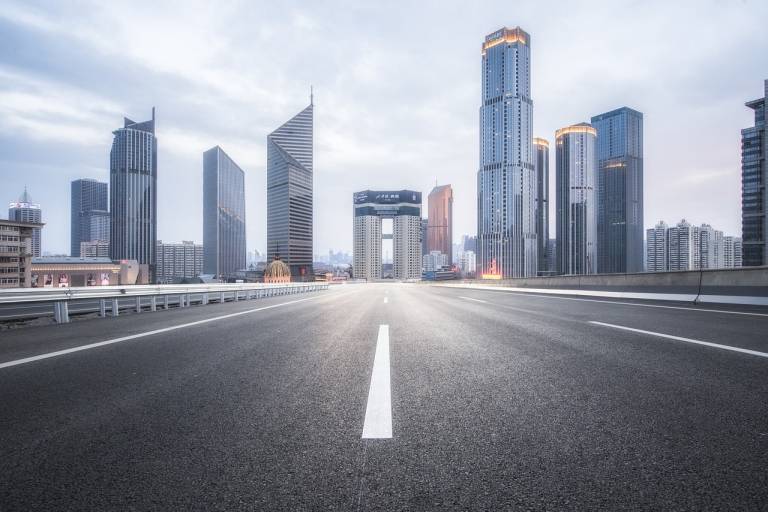 A road leading towards a city.
