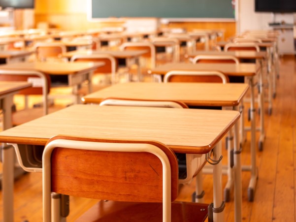 Classroom full of school desks.