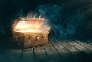 Open an ancient treasure chest that radiated light in the darkness.