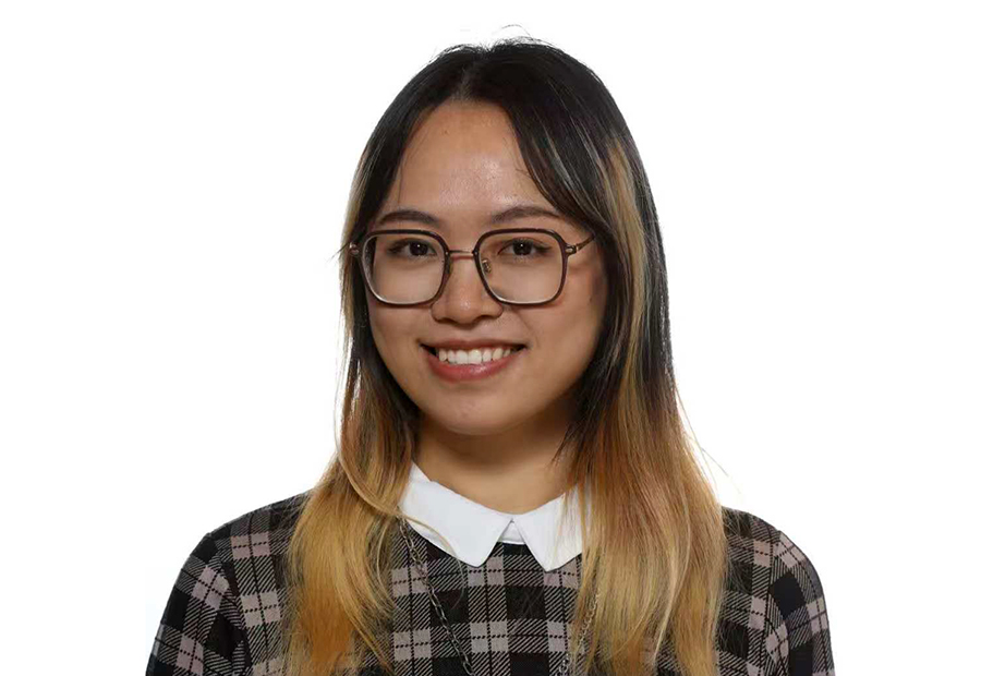 A young woman wearing eye glasses. 