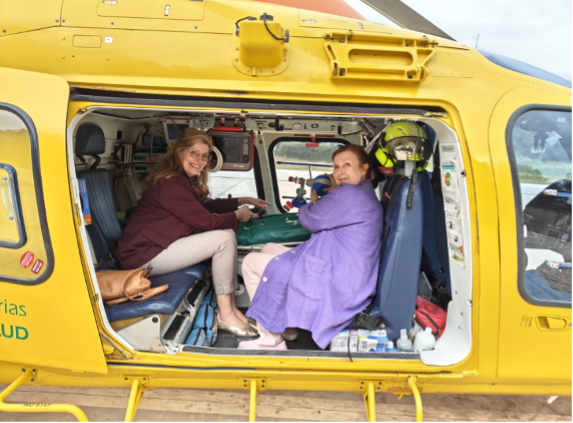 Gitte Taulo and Stiina Storvik-Sydänmaa in a rescue helicopter. This model is small, but its advantage is speed and the ability to land even in challenging environments