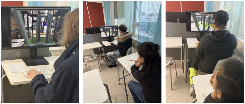 Students in front of computer screen using a simulation game.