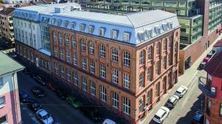 The image shows a three-storey historical building