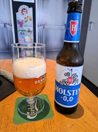 The image shows a bottle of alcohol-free beer