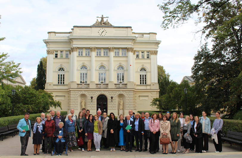 a group of people in front of a building