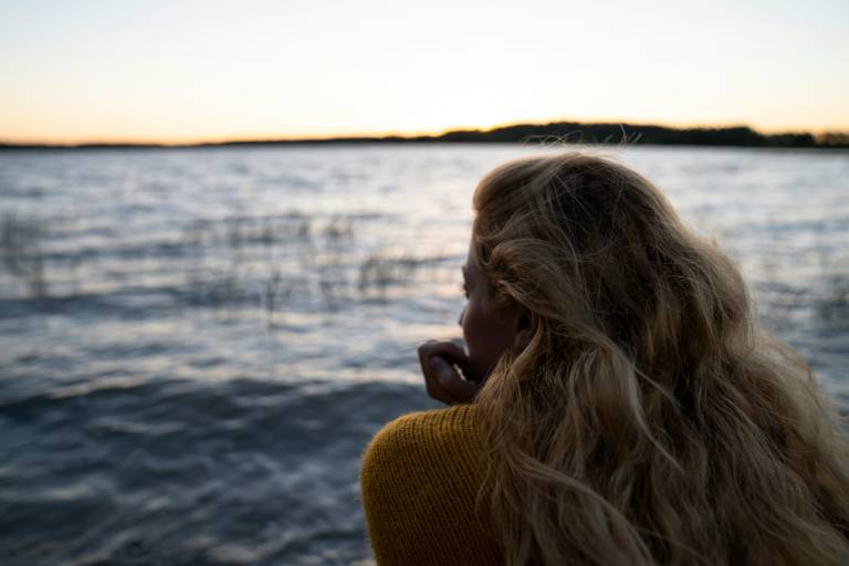Girl looking at late.
