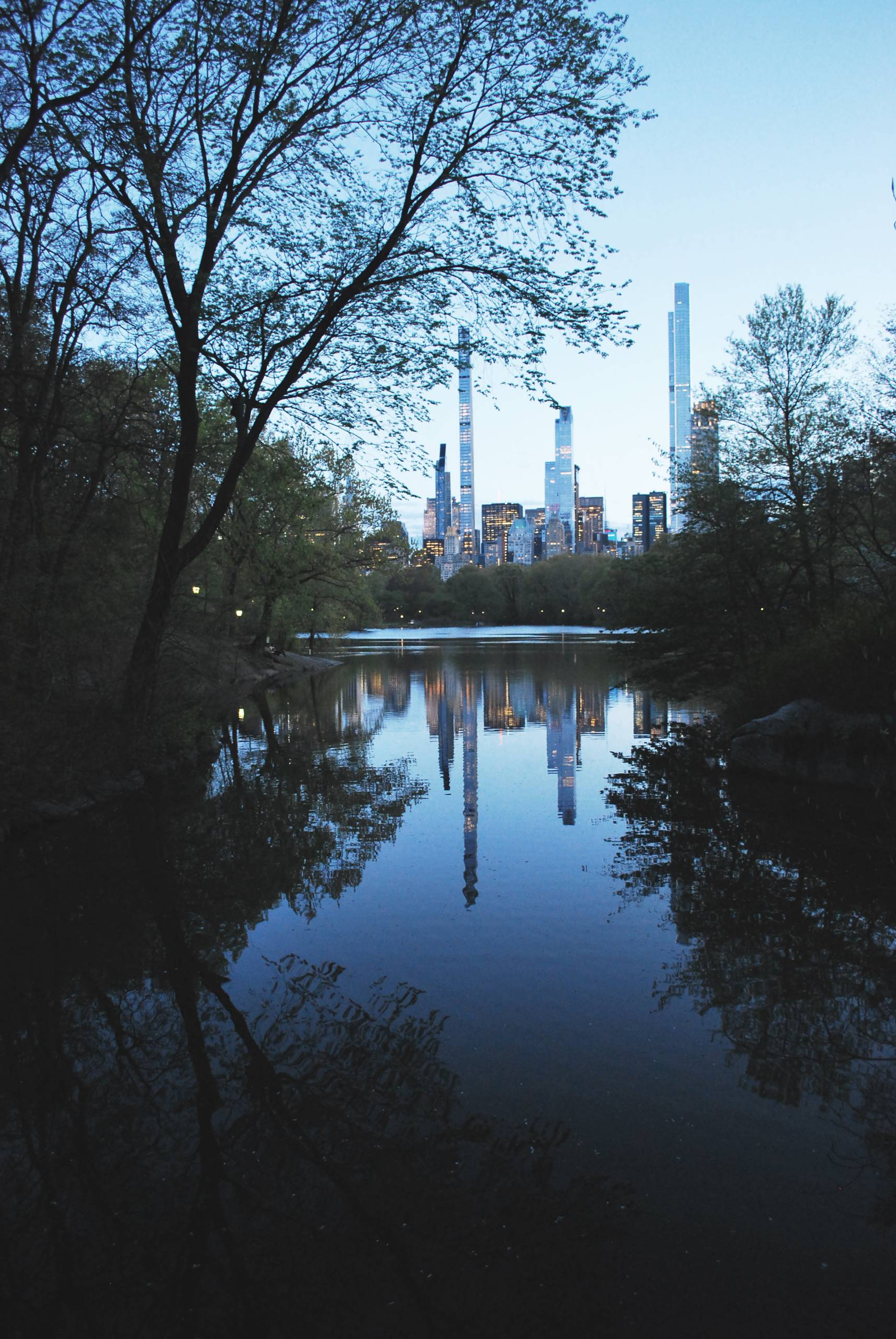 Pencil towers seen from Central Park at dusk
