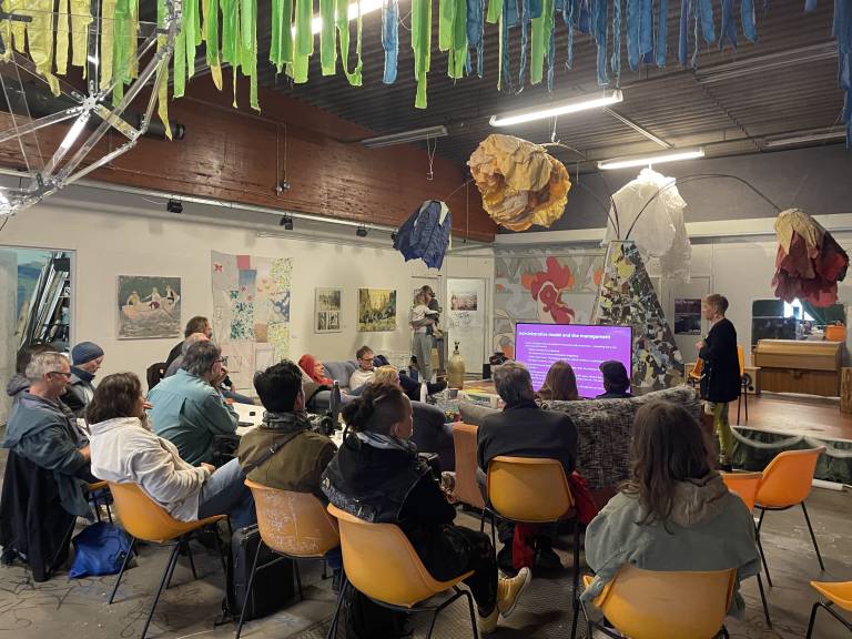 People listening to a presentation