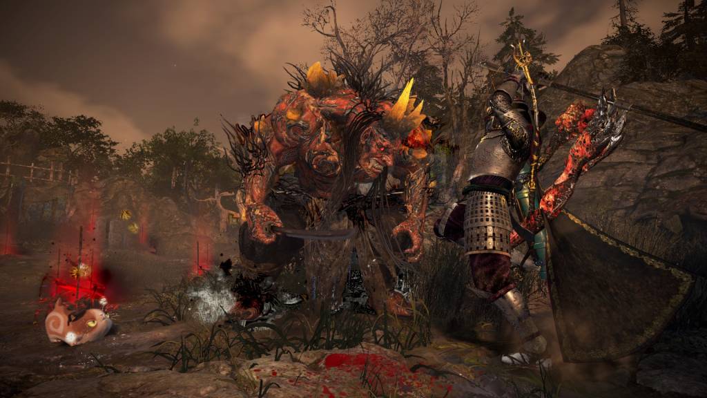 A brown-colored area where an armored warrior is attacking a demon.