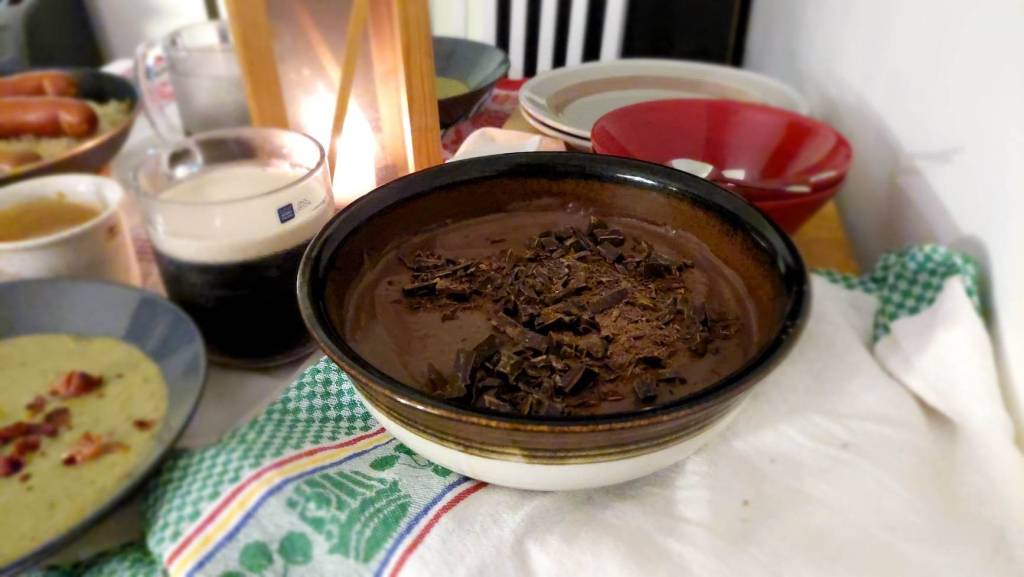 Chocolate mousse, with chocolate shavings sprinkled on top.