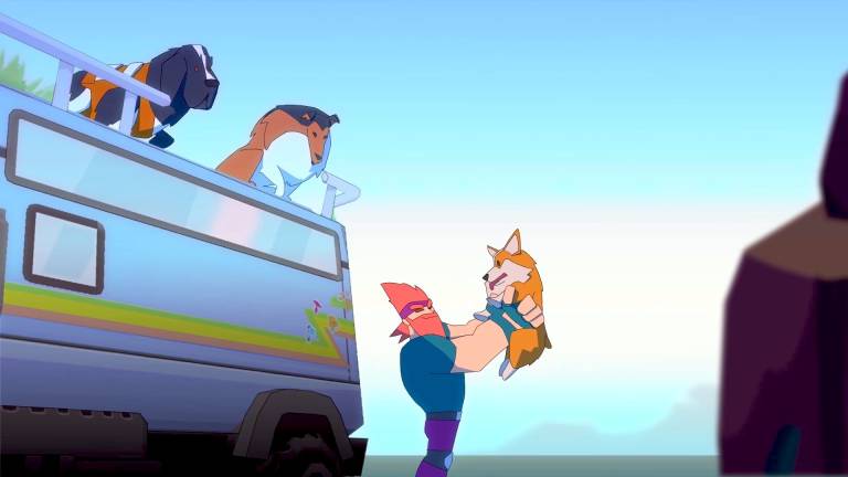 Red haired and bearded man holds up a Corrie. Two dogs watch them atop an RV.