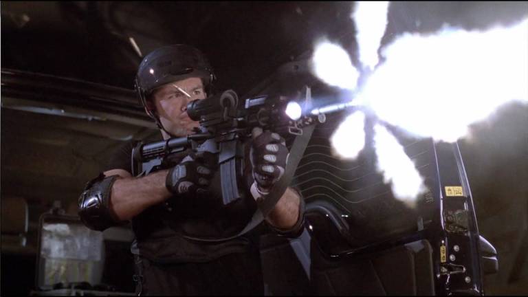 soldier shooting with an assault rifle