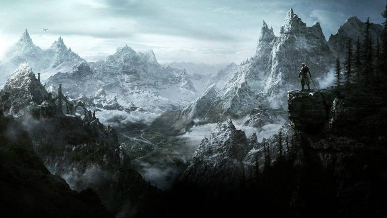 snowy tall spiky mountains with forests dotted in it