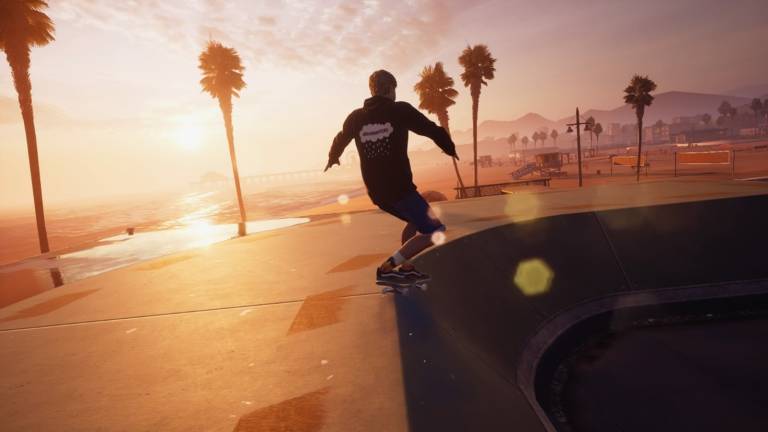 Player doing a grind trick with a sunset on the background.
