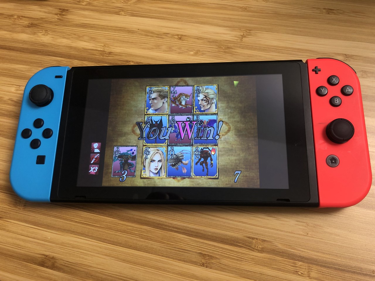Triple Triad minigame played on a Nintendo Switch console