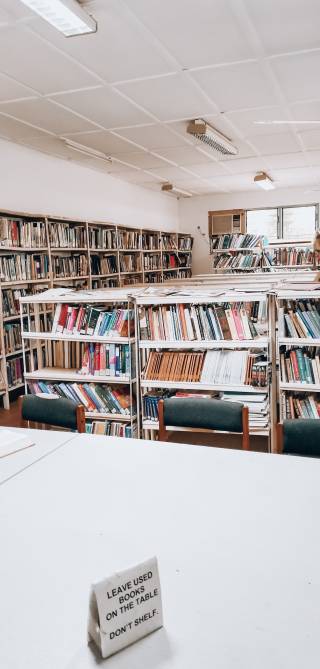 Library full of book shelves.