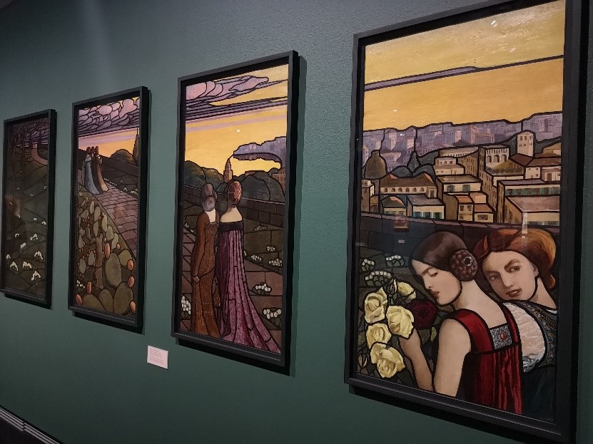 Four paintings, an artwork by Olli and Buckla – stained glass windows