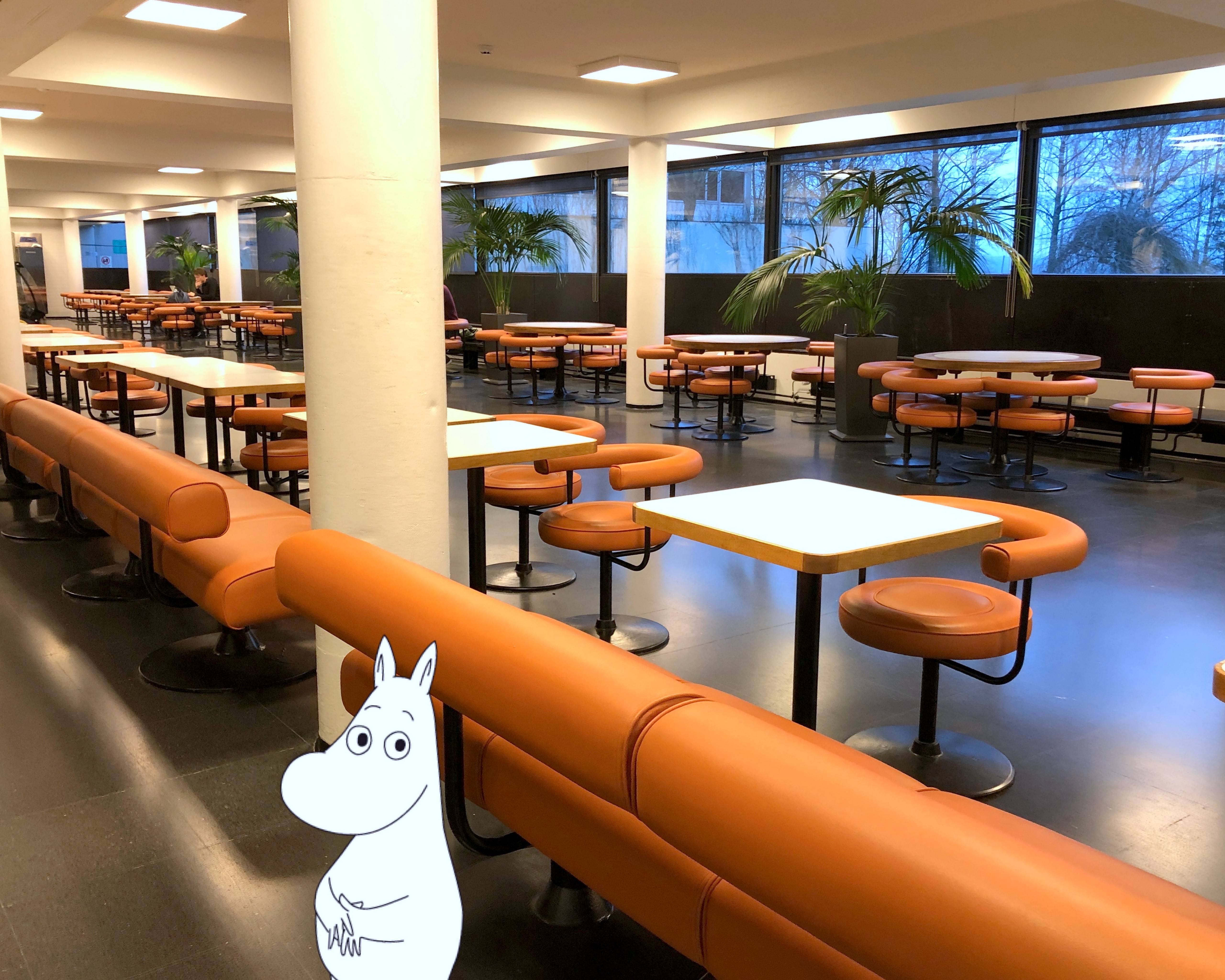 Moomintroll in a campus café.