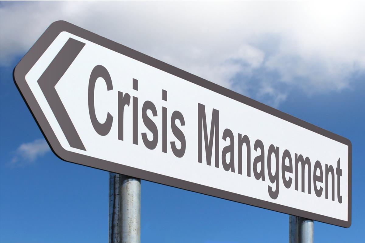 Sign with text crisis management