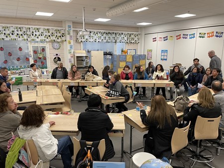 The Chilean participants sitting in a classroom.