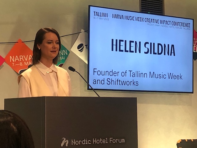 Helen Sildna giving a speech.