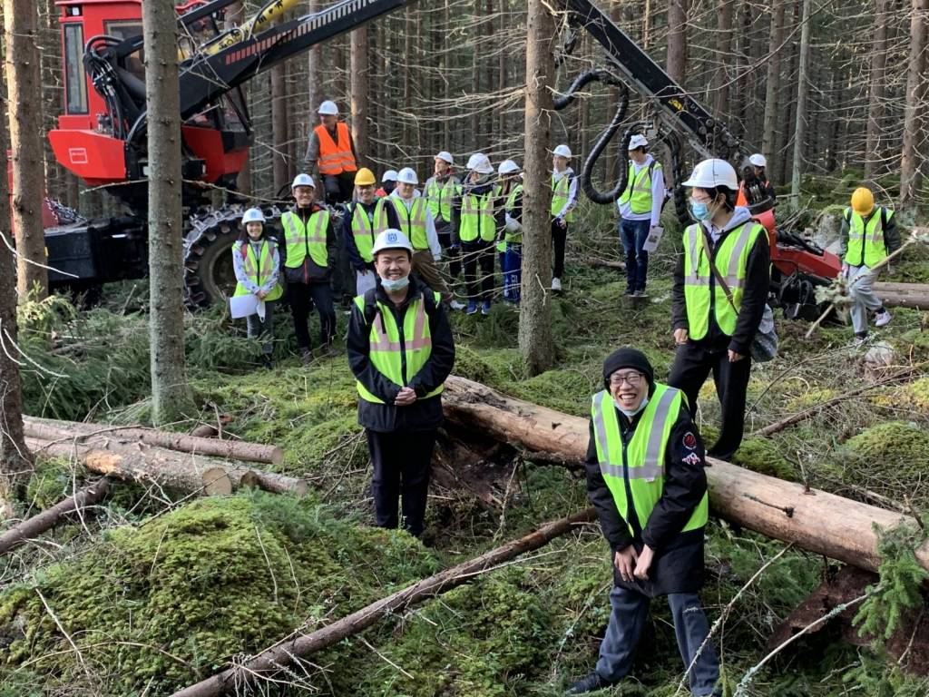 People standing in a forest.