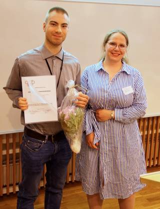 Einari Vaaras receiving MSc thesis diploma