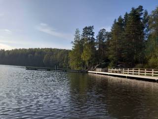 A photo of suolijärvi, with the dock on the right hand side of the photo. 