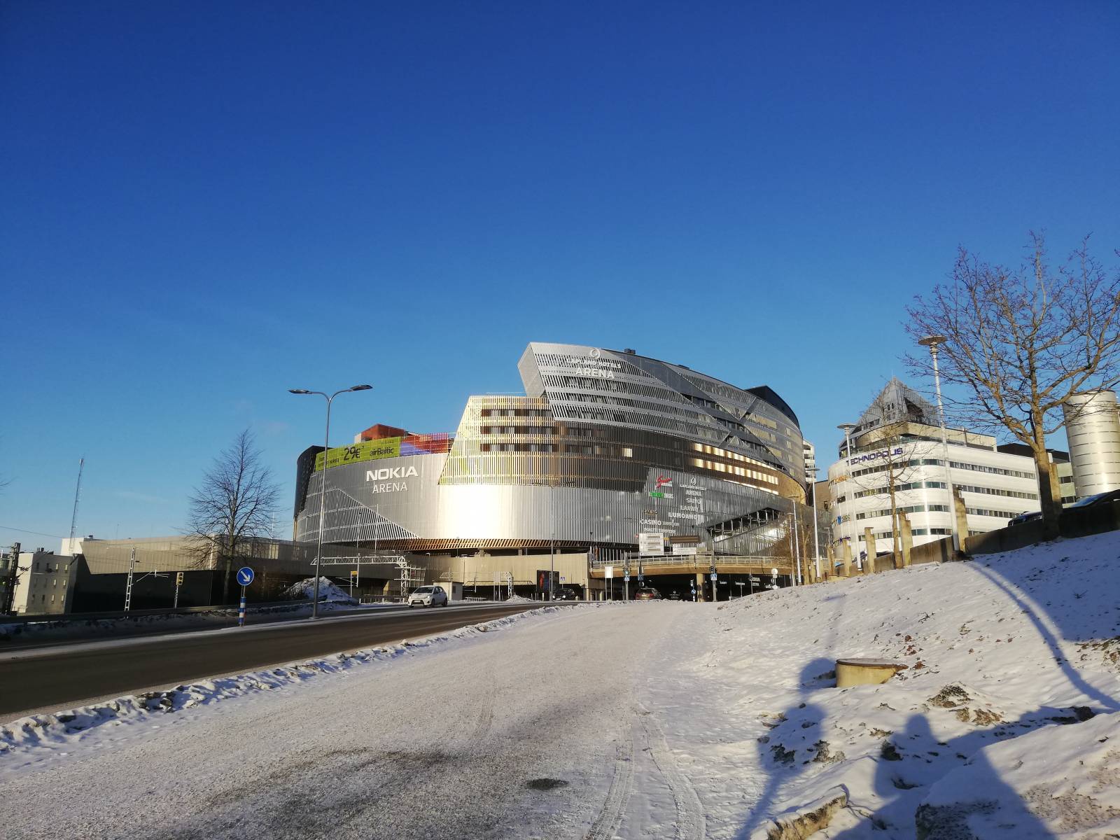 A picture of the Nokia Arena from the university on a beautiful winter day.