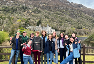 A group of students in front of Kylemore Abbey.