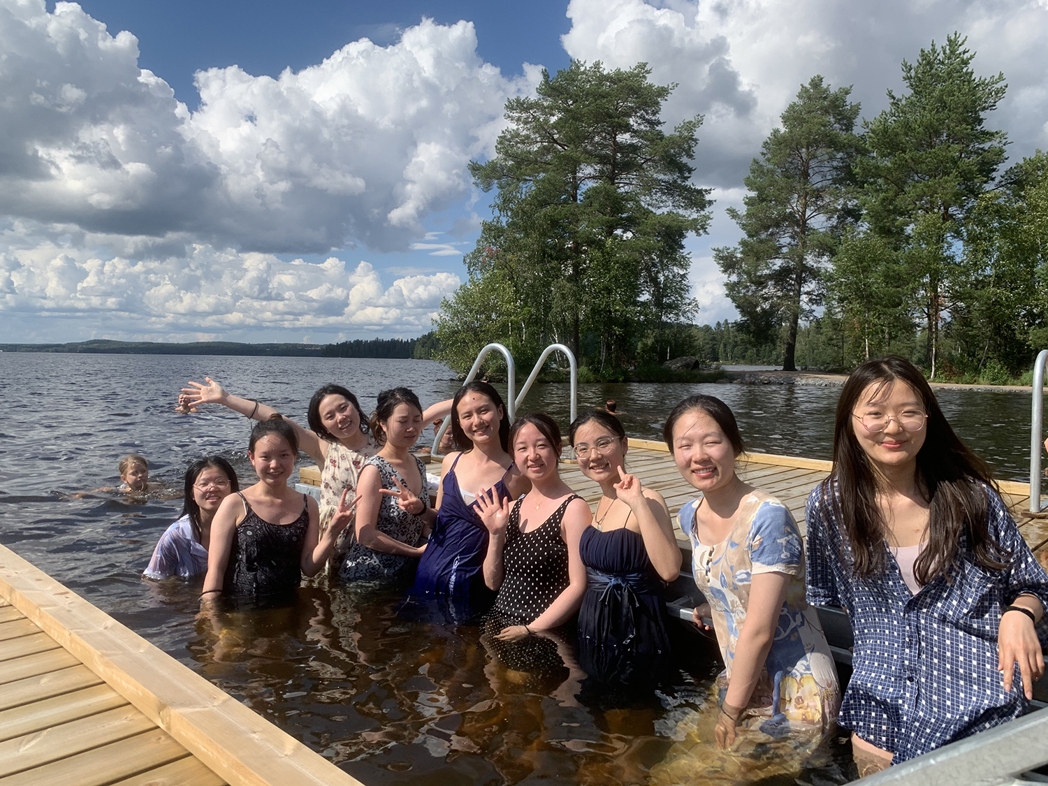 Chinese students swimming in a lake.