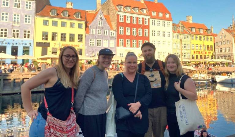 people smiling in Copenhagen Nyhavn