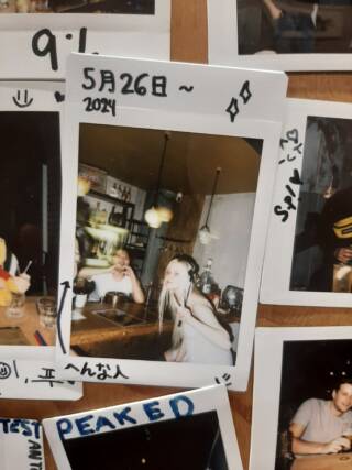 Polaroid of the writer and her coworkers taken at the workplace